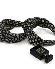 Knot headband made from upcycled chanel camellia scarf