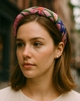 Model wearing pink floral gucci headband made from upcycled silk scarf