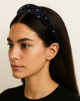 Model wearing Alice Headband made from black Gucci men's silk tie