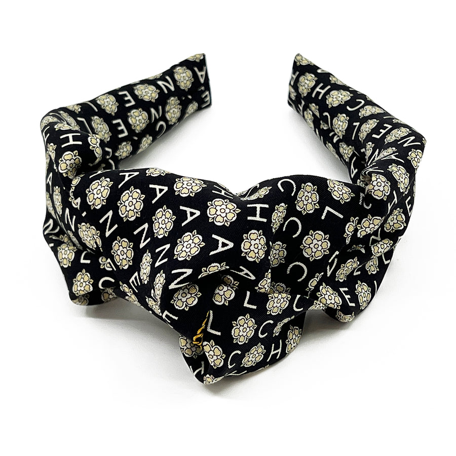Knot headband made from upcycled chanel camellia scarf