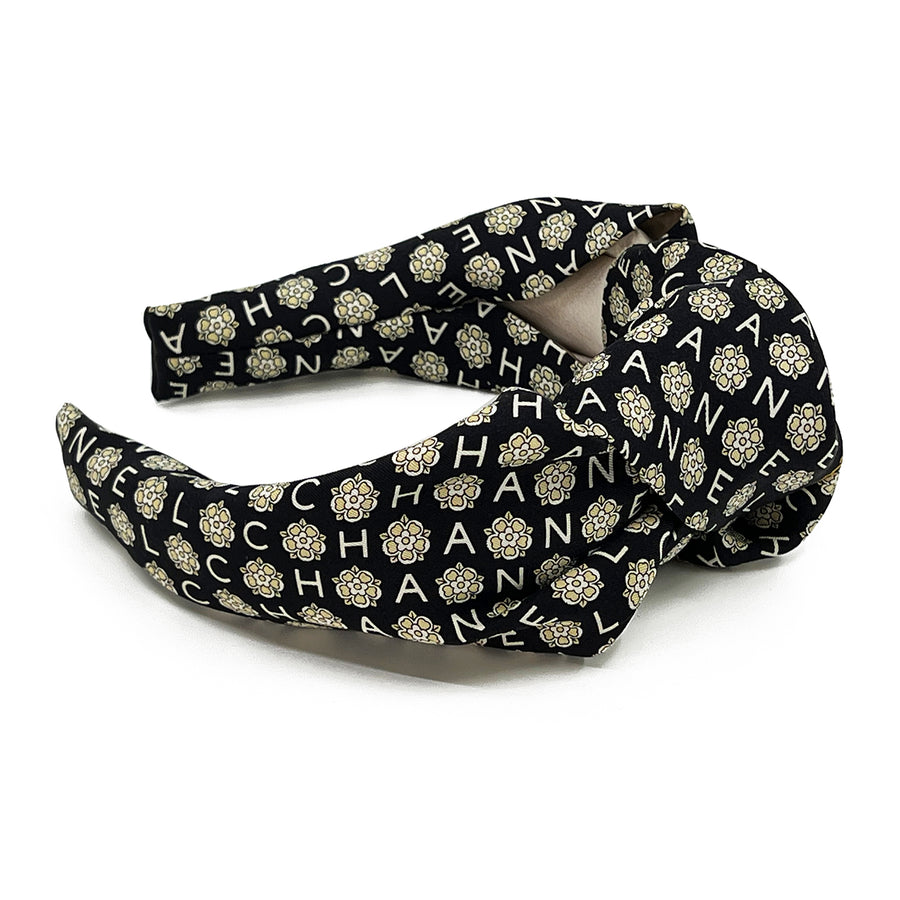 Knot headband made from upcycled chanel camellia scarf