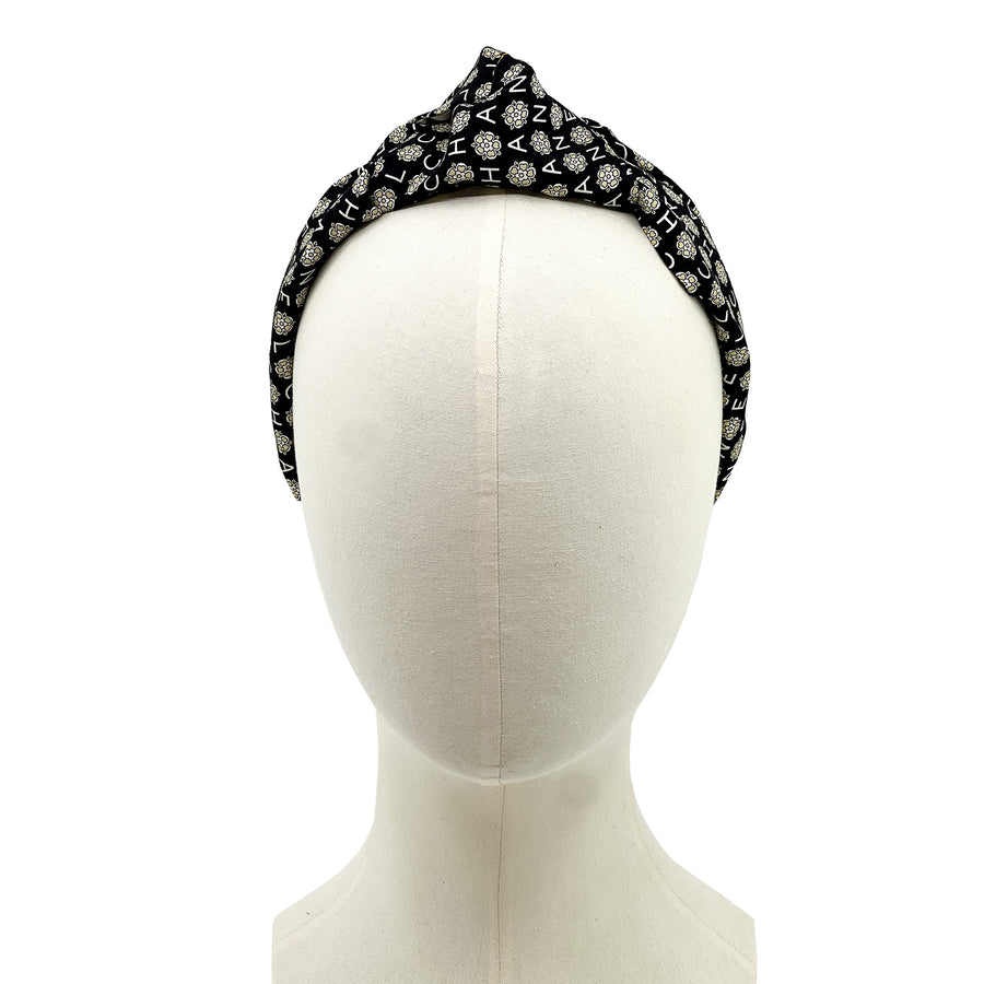 Knot headband made from upcycled chanel camellia scarf