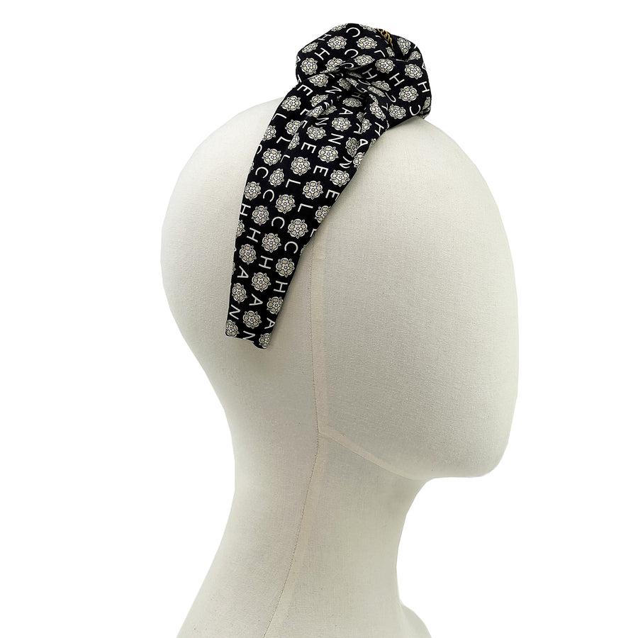Knot headband made from upcycled chanel camellia scarf