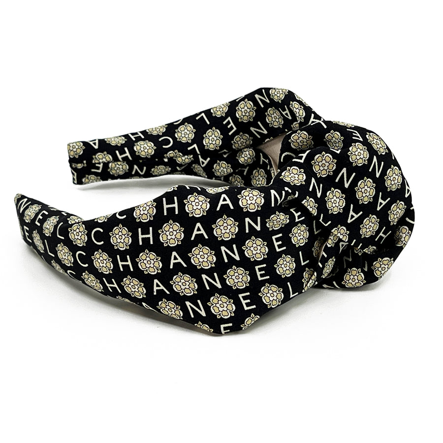 Knot headband made from upcycled chanel camellia scarf