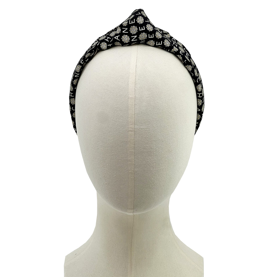 Knot headband made from upcycled chanel camellia scarf
