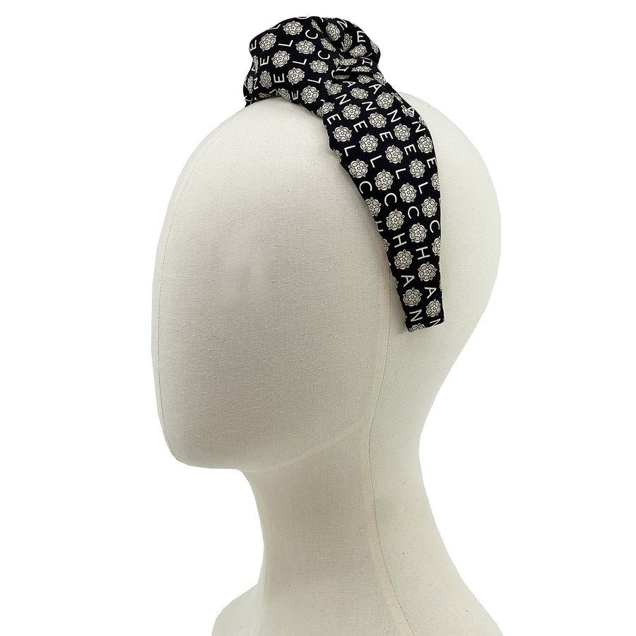 Knot headband made from upcycled chanel camellia scarf