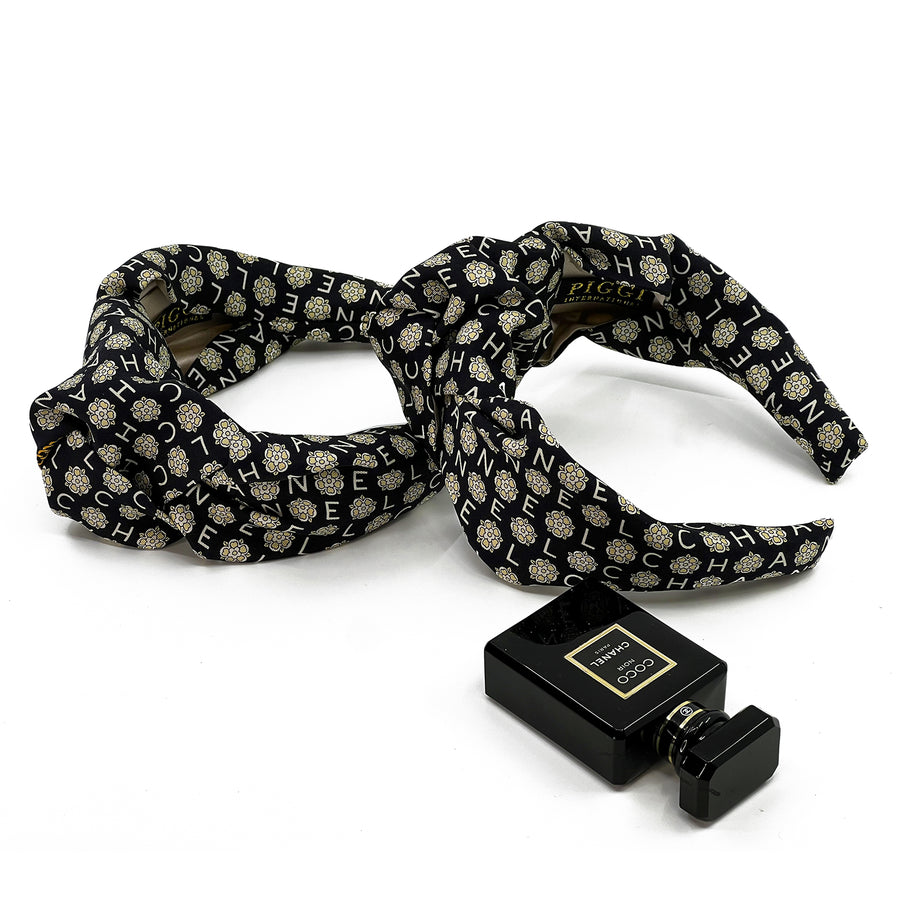 Knot headband made from upcycled chanel camellia scarf